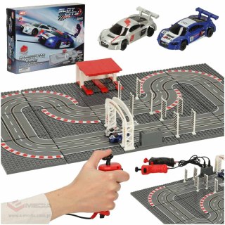 Tor wyścigowy samochodowy elektryczny policyjny 2 auta autka kontrolery zakręty klocki konstrukcyjne GD-02