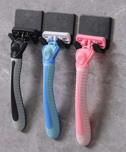 Self-adhesive holder / hanger for razors