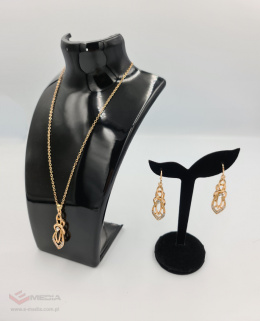 A set of geometric necklace + dangling earrings